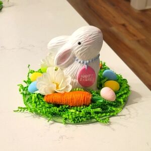 Easter Bunny Figurine with Eggs and Carrot Size- 6 1/2 " round and 5" tall.